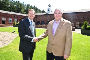 Cybertill's Ian Tomlinson, right, together with Lord Derby, who officially opened the firms new offices based in the ground of his estate at Knowsley Park